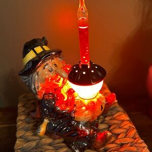 Charming Witch Figurine with Red and Black Accents